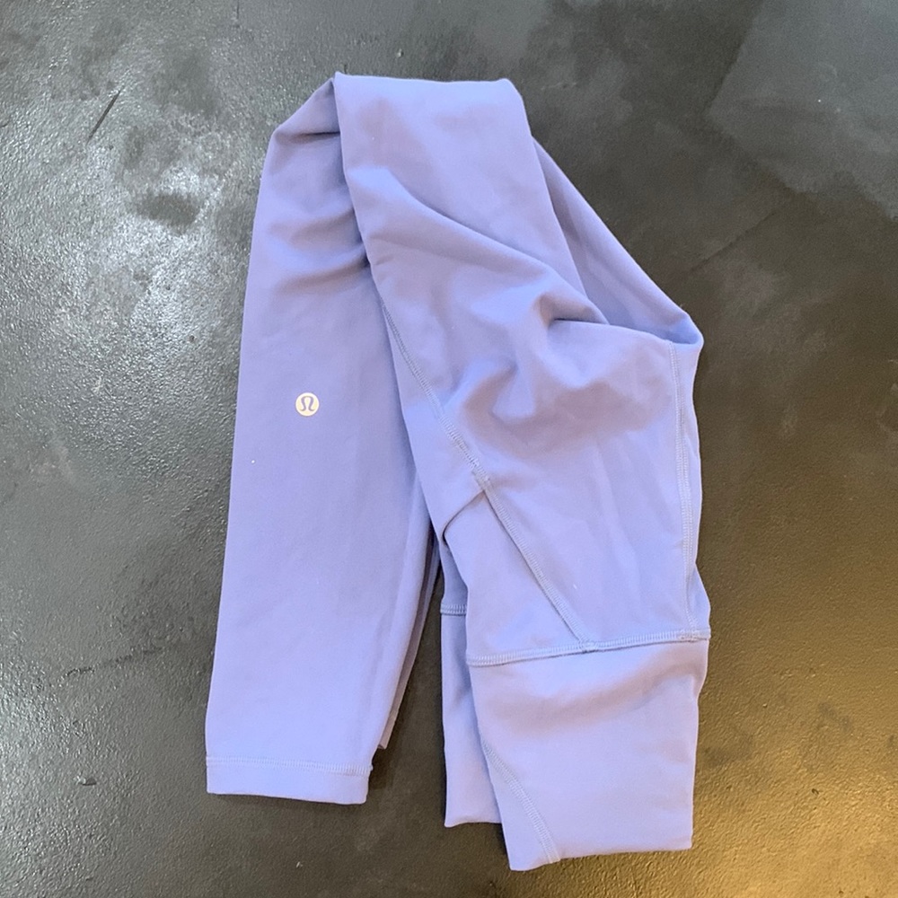 Dull Blue/Purple Color. Has Pockets, Good Condition, (No Rips, Loose String, …)